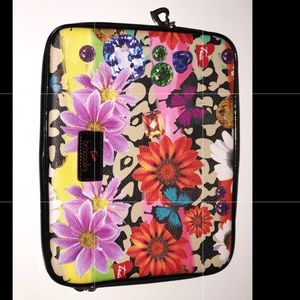 A customized iPad case (heart-shaped zippers)